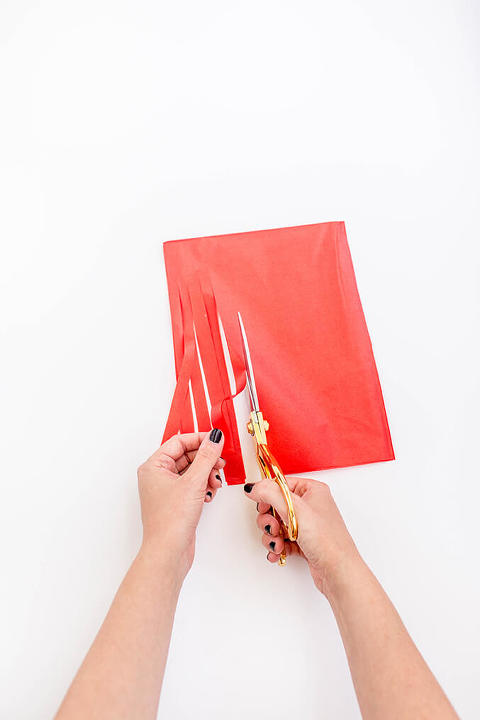DIY Red, White And Blue Tissue Paper Fireworks Banner | dreamgreendiy.com + @orientaltrading