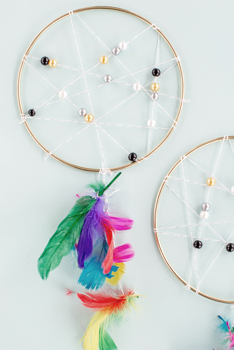 How To Make A DIY Beaded & Feathered Dream Catcher | dreamgreendiy.com + @orientaltrading
