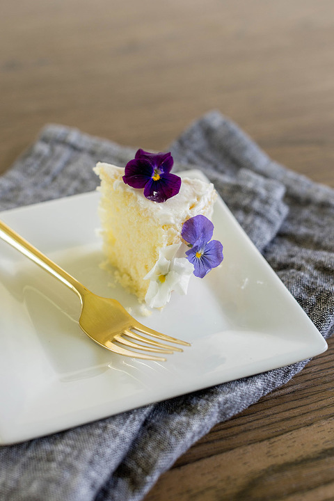 Find out how to turn a clearance grocery store cake into a Pinterest-worthy naked cake with edible flowers.