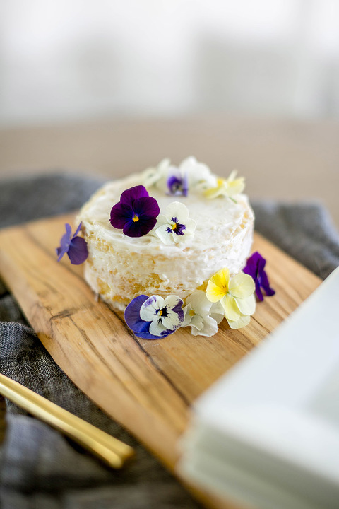 Find out how to turn a clearance grocery store cake into a Pinterest-worthy naked cake with edible flowers.