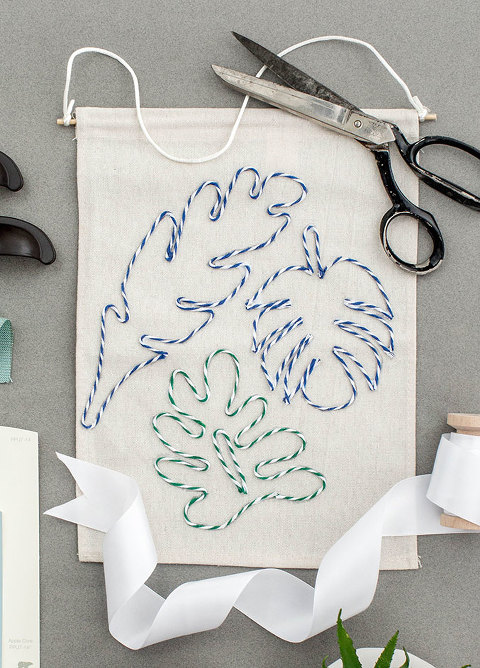 DIY Leafy Baker's Twine Banner | dreamgreendiy.com + @orientaltrading