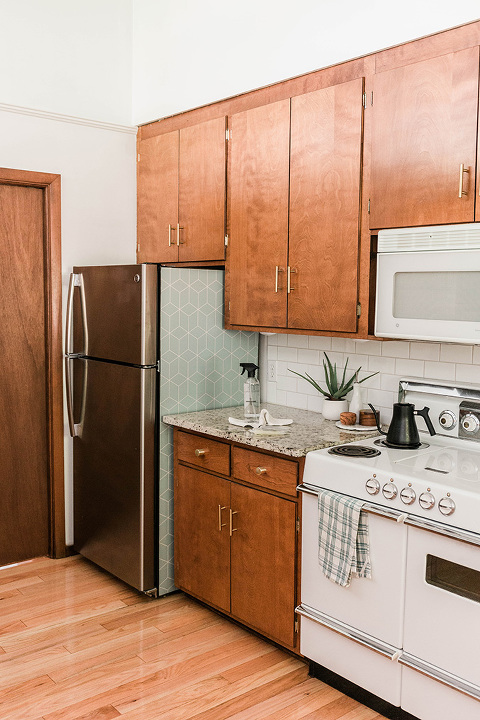 Mid-century stained wood kitchen cabinets