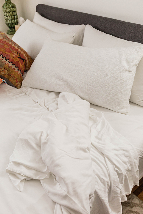 Matching white bedding in the bedroom