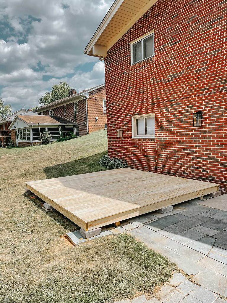 Staining Our DIY Wood Platform Deck