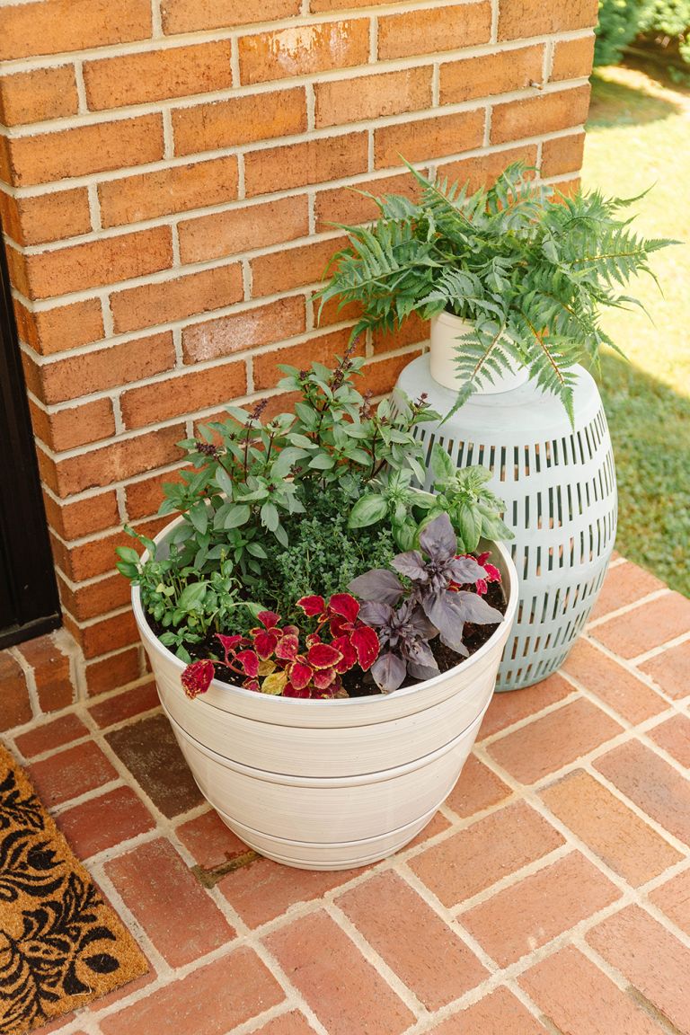 Summer Porch Decorating With Flowers And Herbs