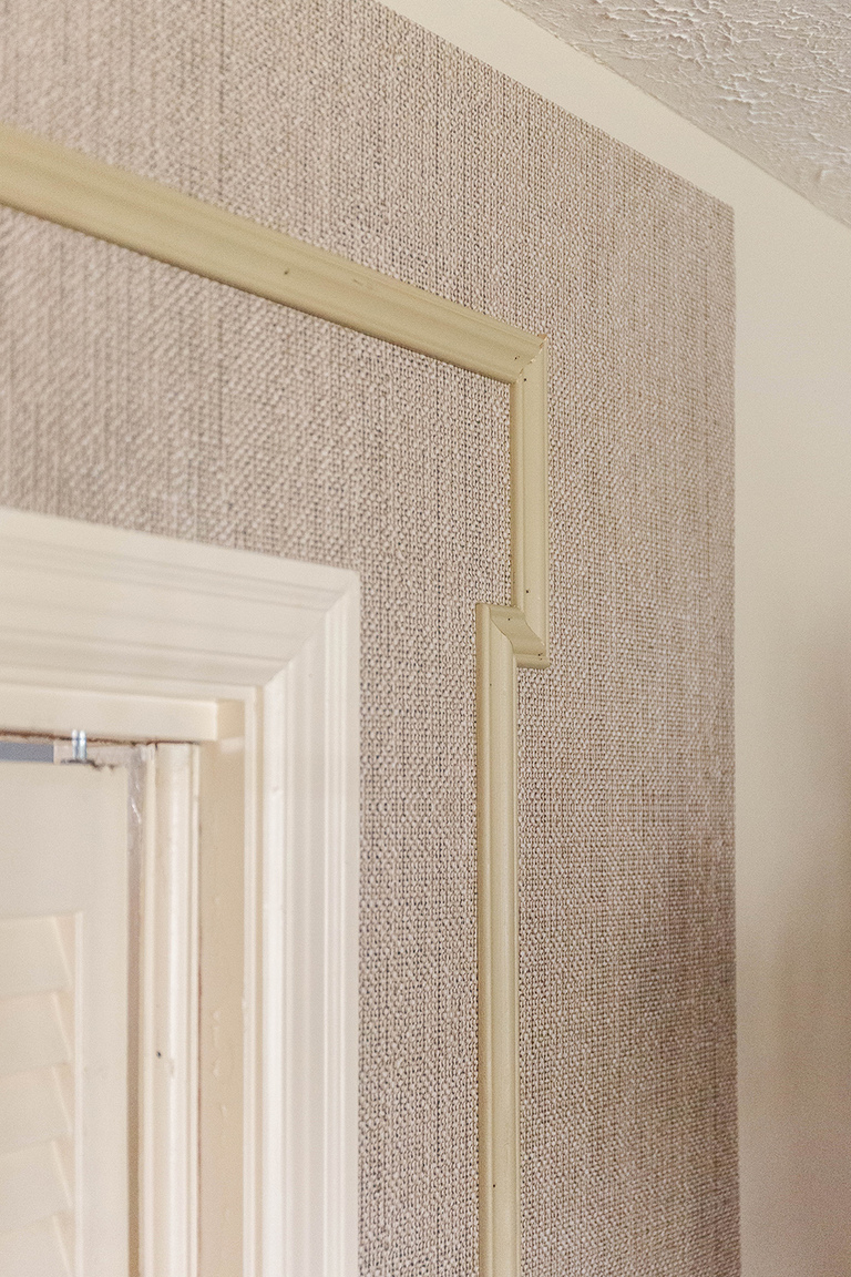 DIY Wallpapered Trimmed Out Doorway